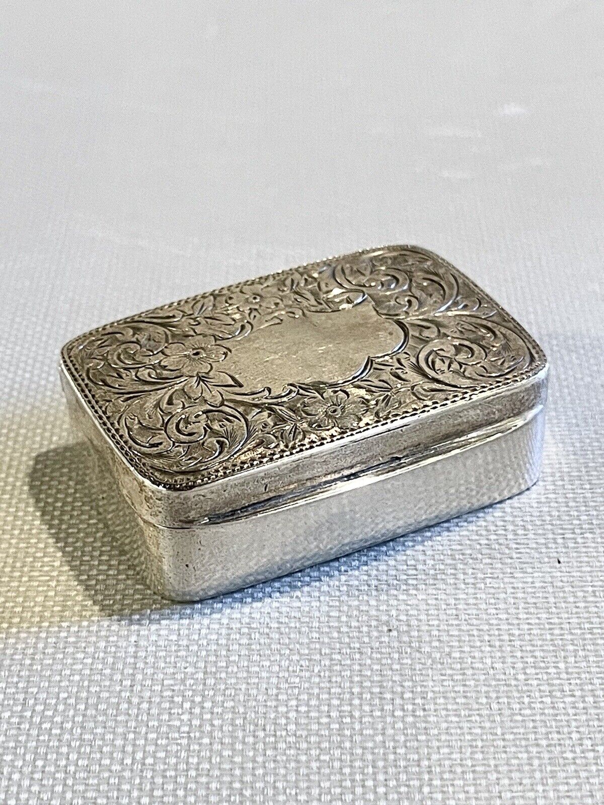 English Late Victorian Sterling Silver Repousse Snuff or Pill Box Circa 1904