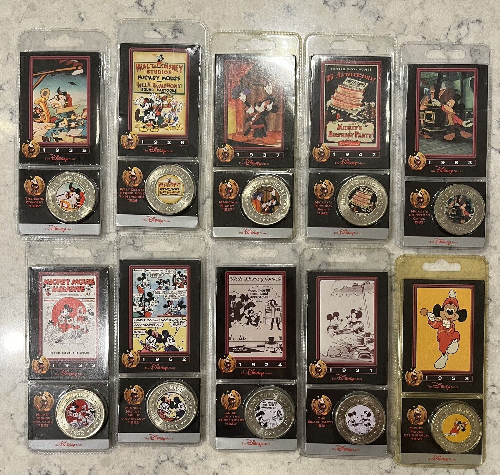 Lot of 10 Sealed Disney Decades Coins & Cards
