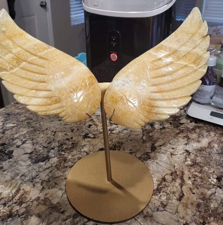 A Pair Of Large Carved Calcite Angel Wings with Stand