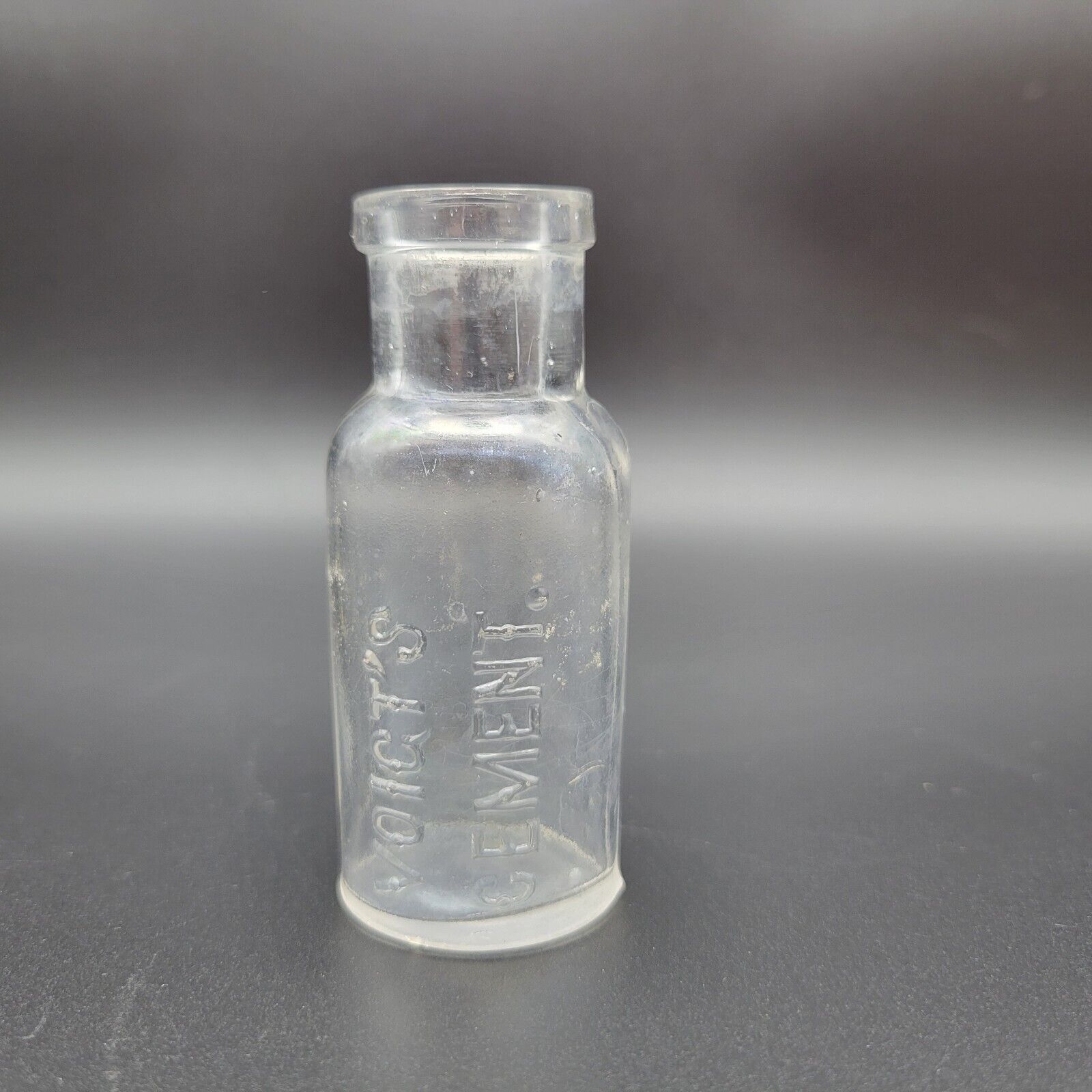 Antique Vintage Voicts Cement Tiny Bottle