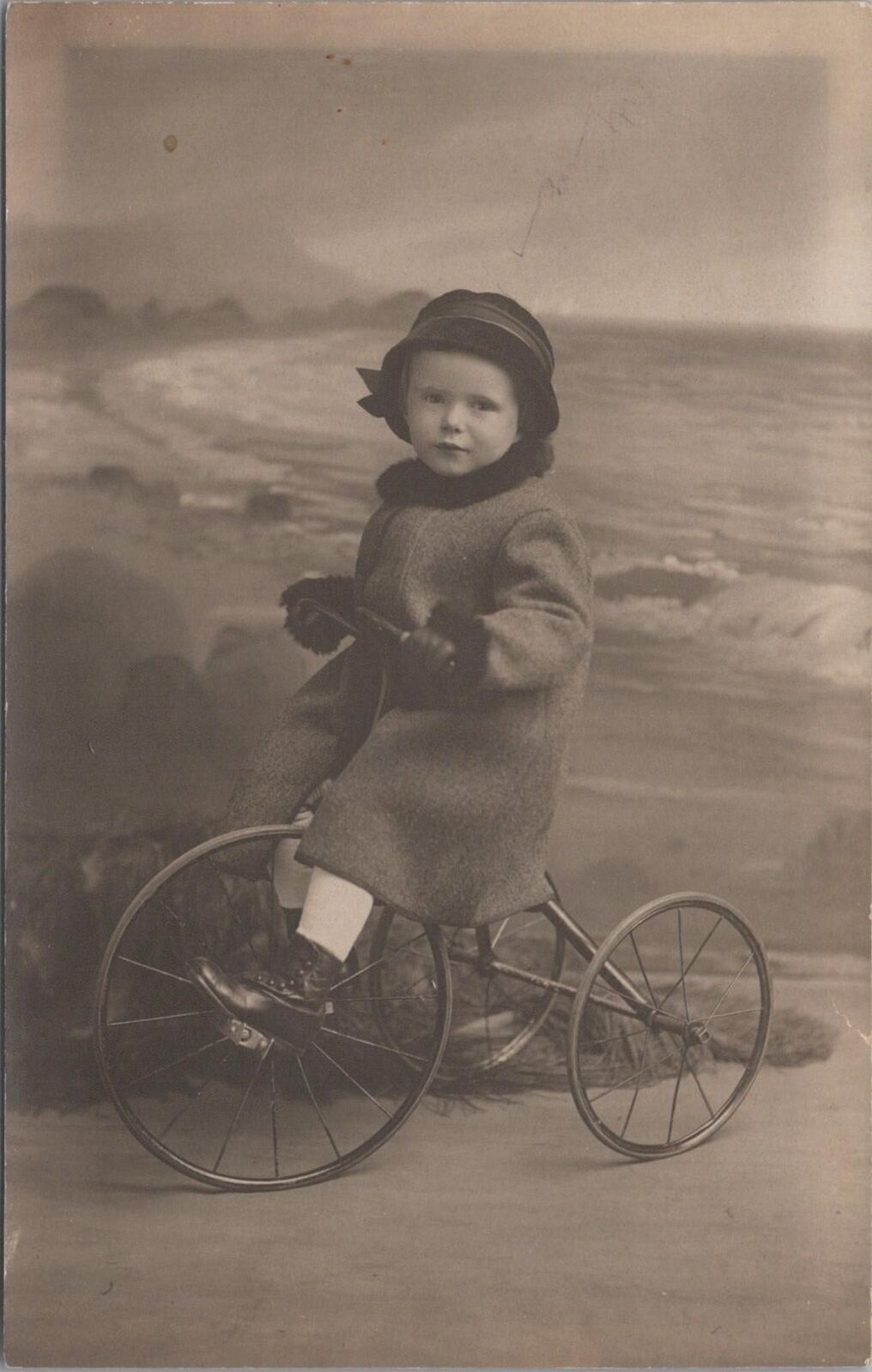 RPPC Postcard Little Girl Riding Tricycle 