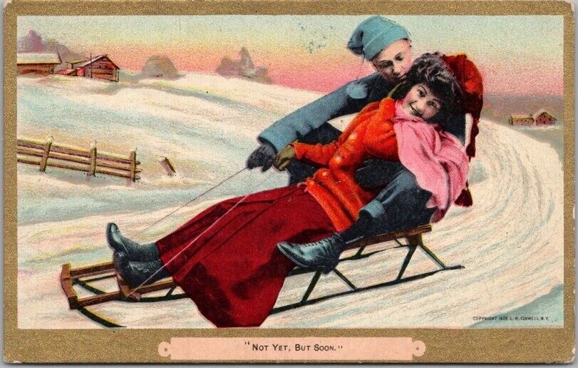 c1910s Winter Sports / Romance Postcard Couple on Sled 