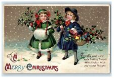 c1910's Merry Christmas Boy Girl Warmer Basket Holly Clapssadle (?) Postcard picture