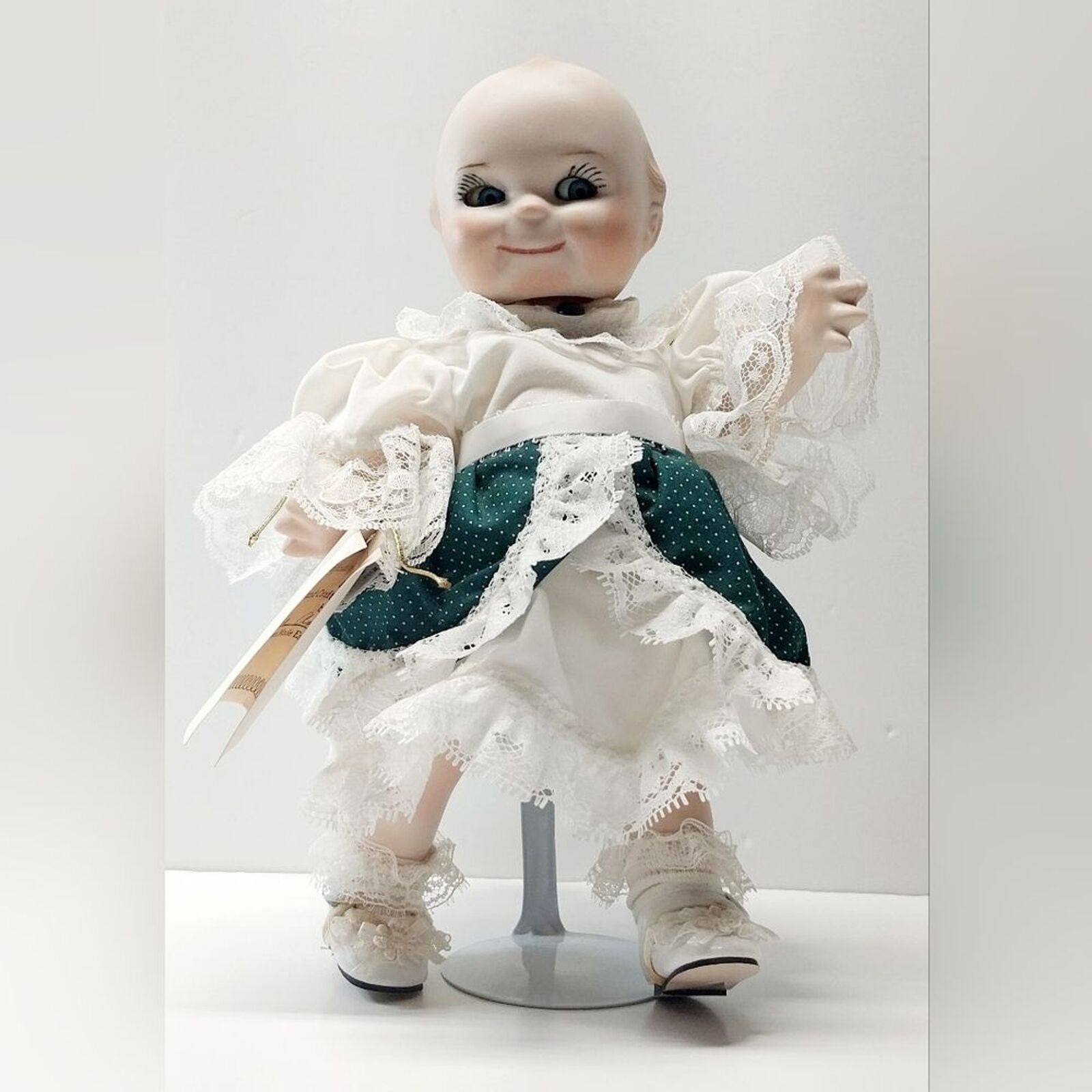 Vintage Handcrafted Original Barbara Ann Nulty Kewpie Doll with Stand Porcelain