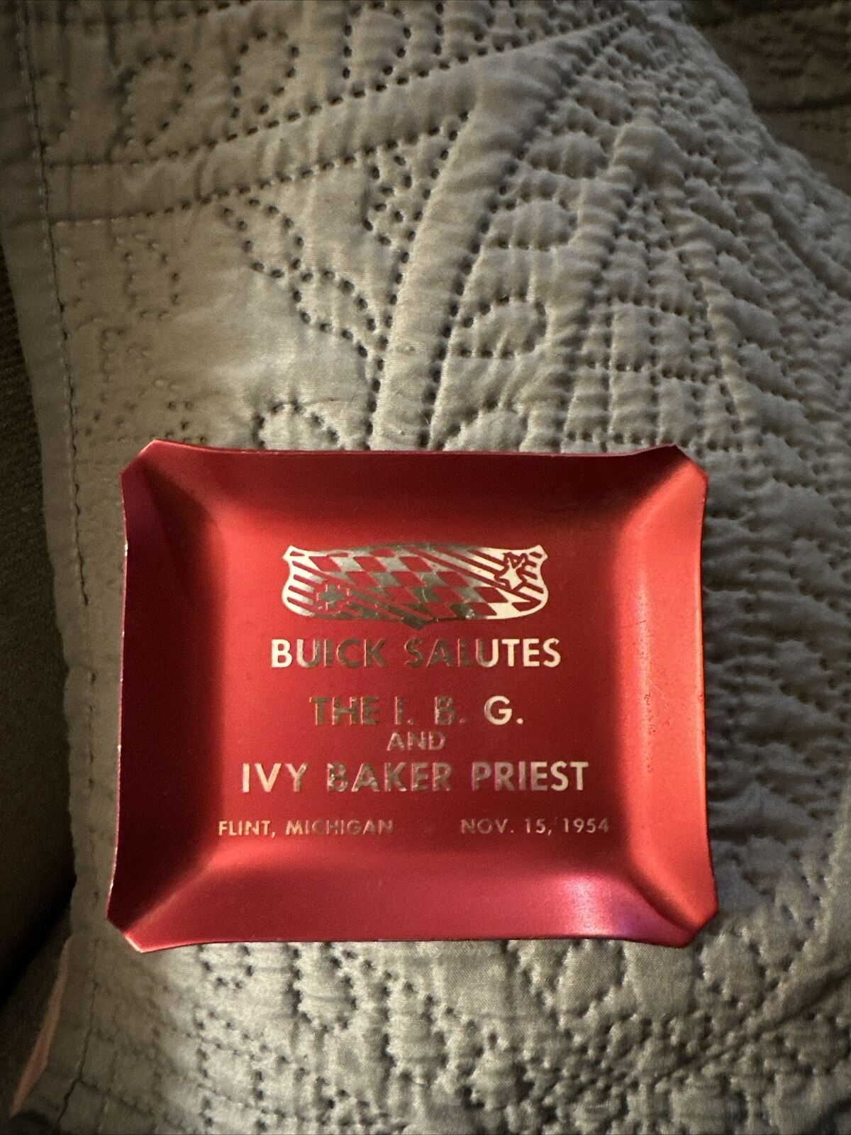 VTG 1954 BUICK SALUTES THE I.B.G. & IVY BAKER PRIEST FLINT MI. RED METAL ASHTRAY