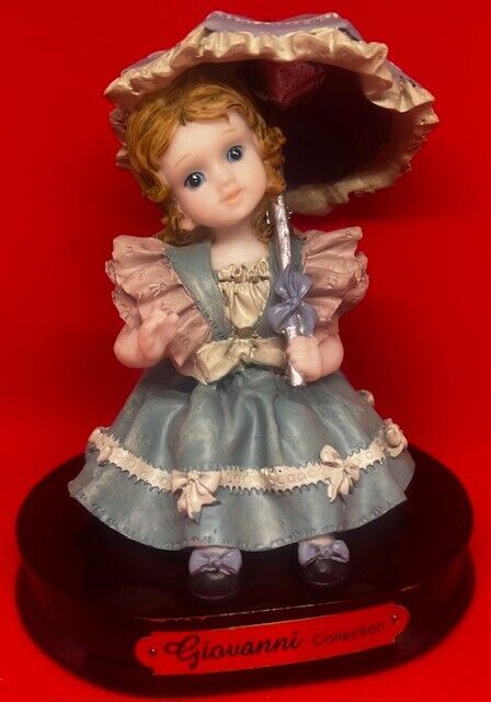 Vintage Giovanni Collection Girl with Blue Umbrella Dress wood base Figurine