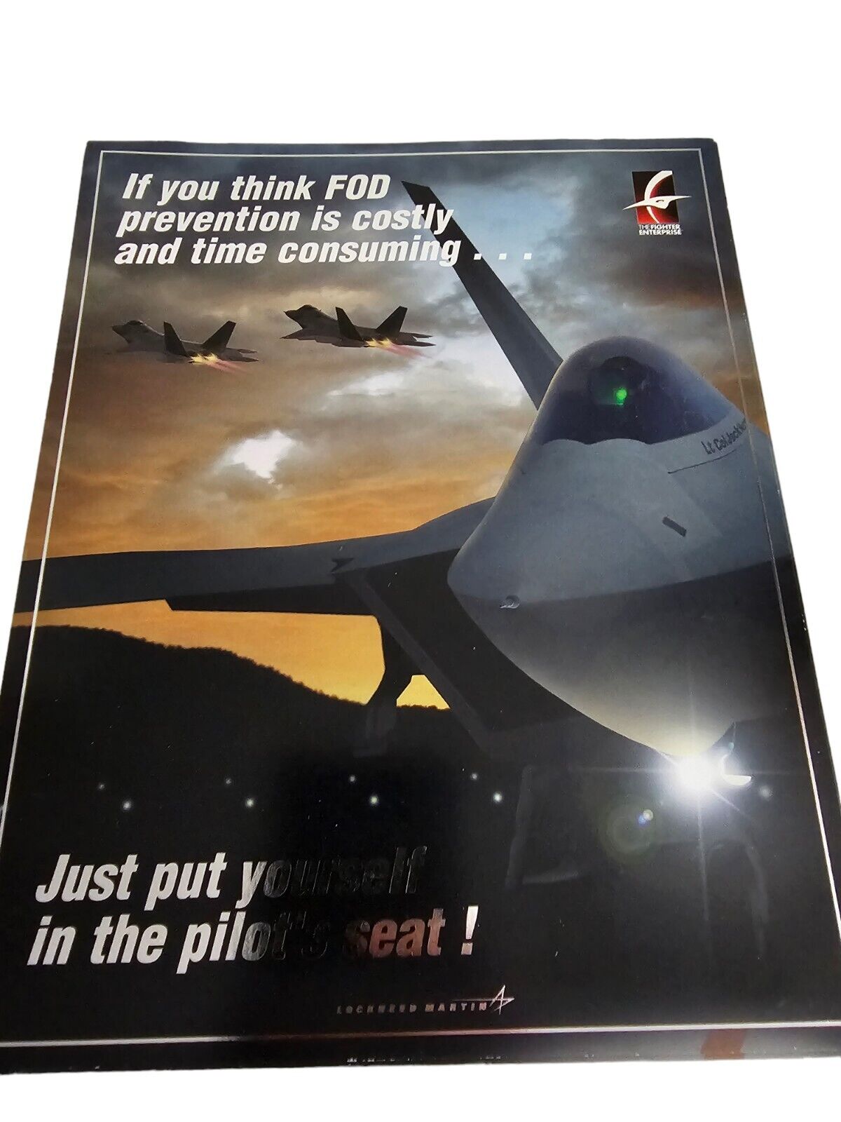 Lockheed Martin FOD poster advertisement Prevention Pilots Seat