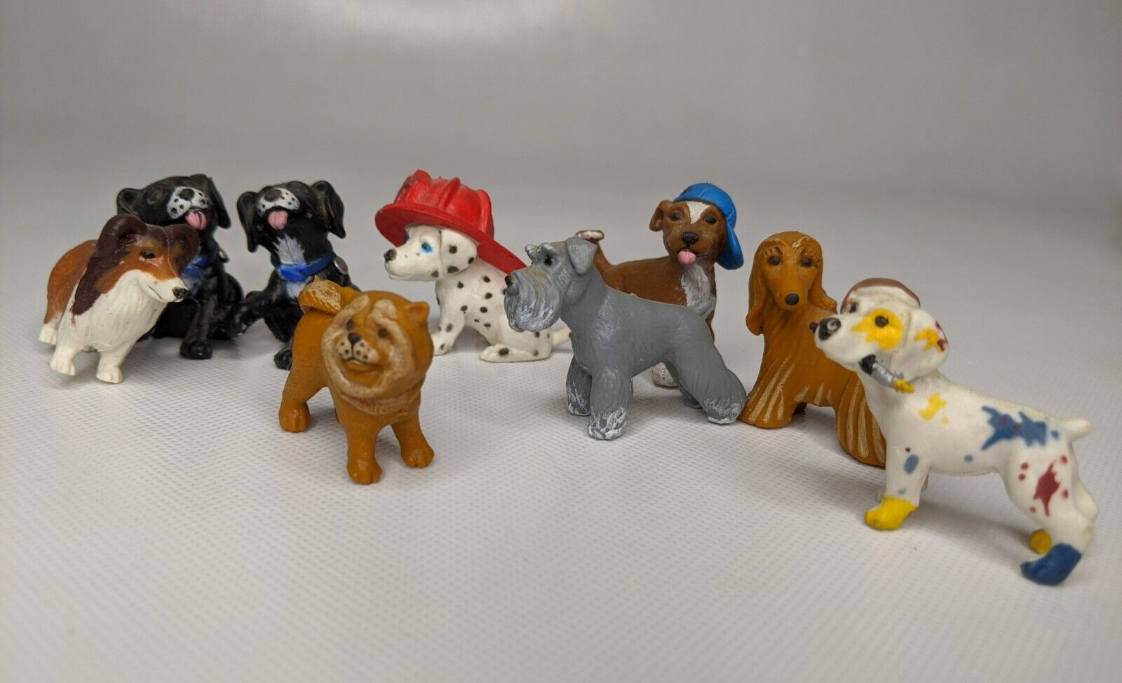 LOT of 9 Topps 1997 Toy Dogs Schnauzer, Collie, Chow Chow, Dalmatian.. 1.5” Tall