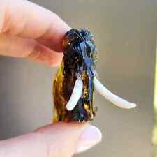 Fossil Amber Carved Mammoth Figurine picture