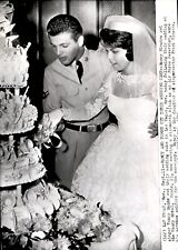 LG9 1960 AP Wire Photo NANCY SINATRA & TOMMY SANDS CUT WEDDING CAKE LAS VEGAS picture
