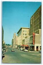 1958 View Looking West On Sixth Street Hotel Warrior Cars Sioux City IA Postcard picture